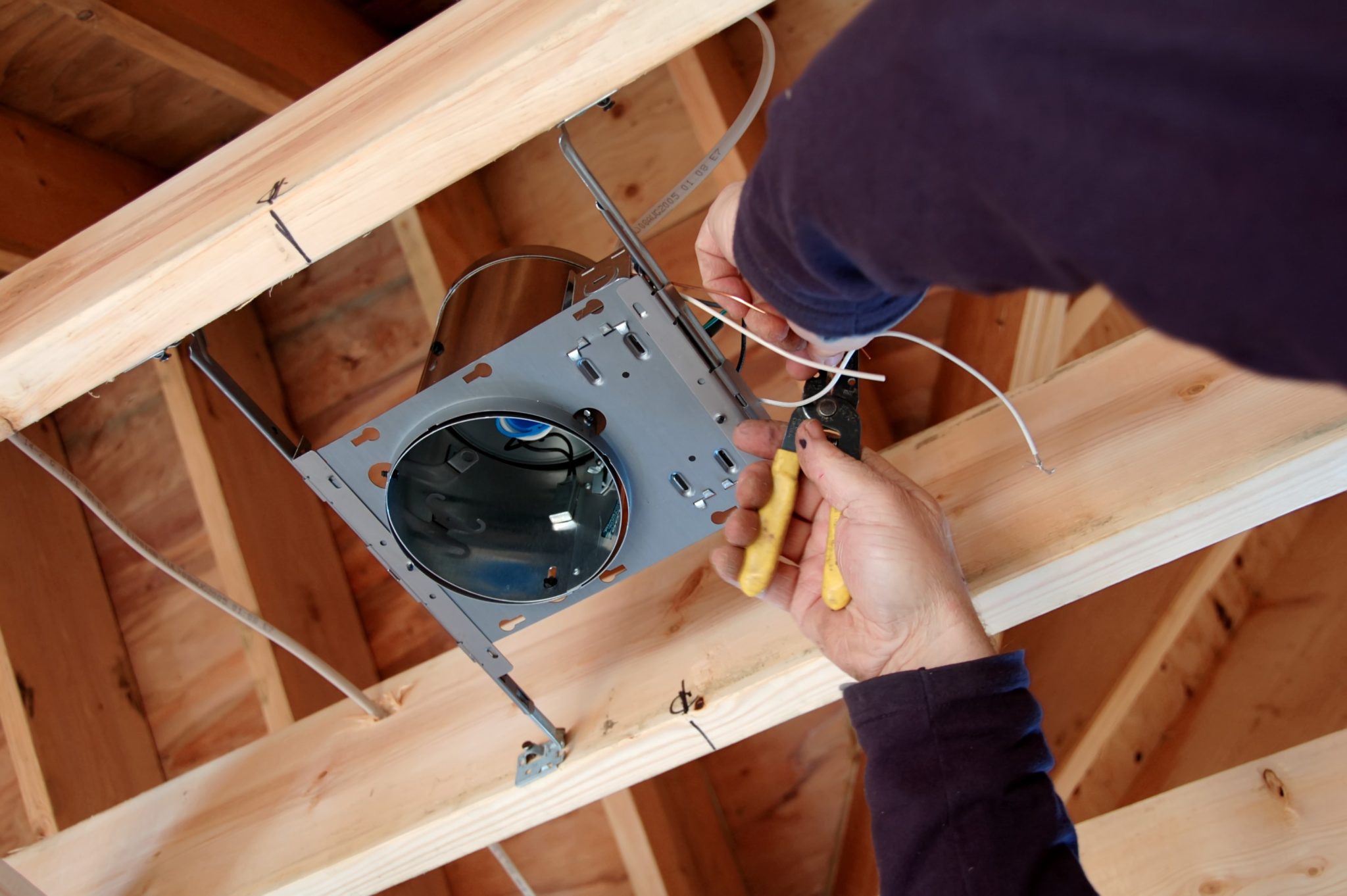 a lightbox being installed in a commercial build out